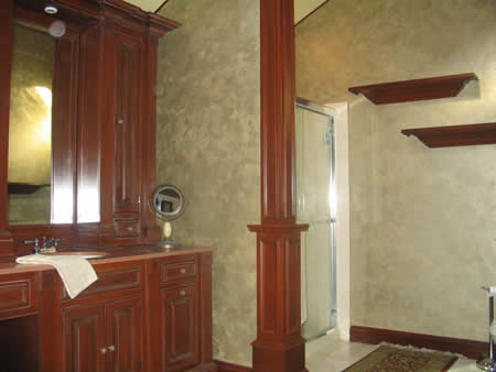 Vanity, column and shelves. Textured wall finish.